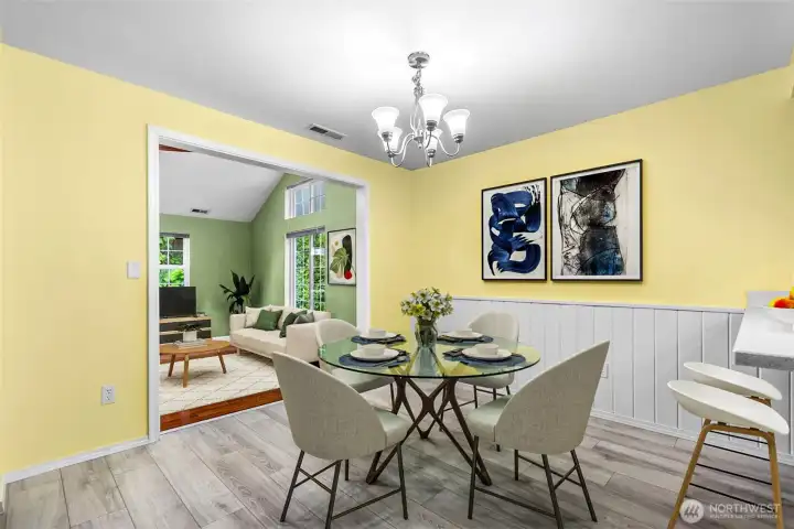 The dining area looking toward the large family room. This photo is virtually staged.