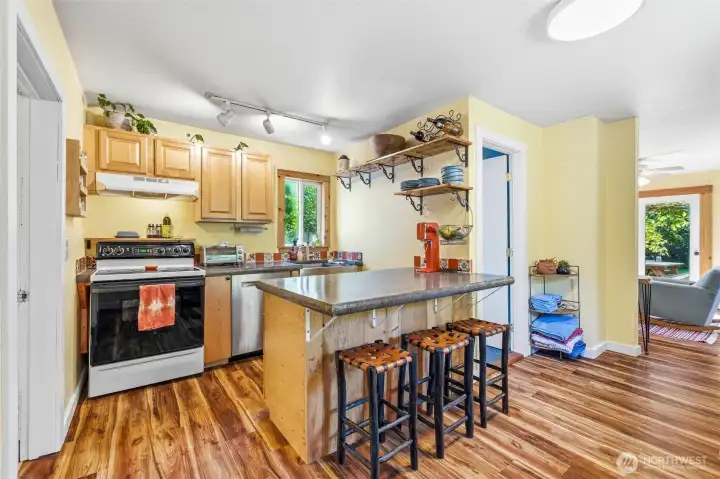 Inside is a nicely updated kitchen bar seating Inside is a nicely updated kitchen bar seating