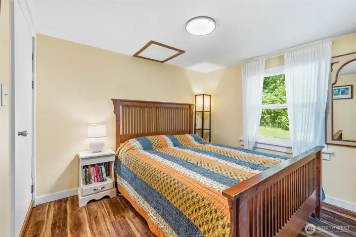 The bedroom is just off the kitchen. The bedroom is just off the kitchen.