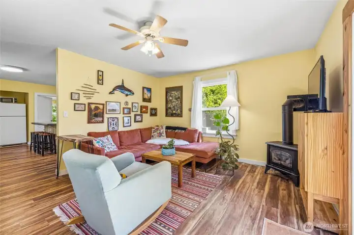 This sitting room is cozy with the gas stove. This sitting room is cozy with the gas stove.