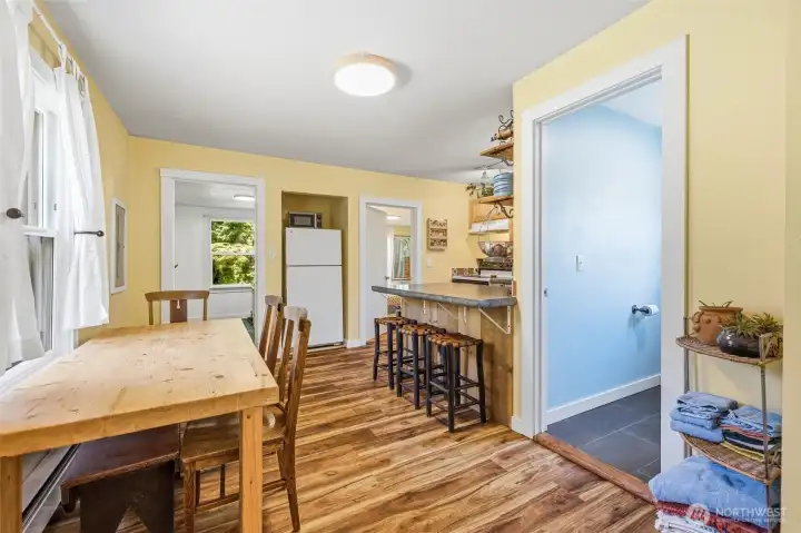 The bathroom is between the kitchen and living rea The bathroom is between the kitchen and living rea