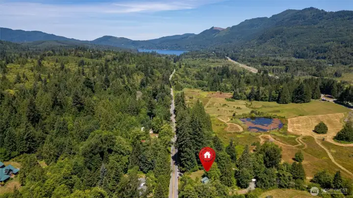 A view of the home looking north towards Lake Samish. Blanchard Hill trailhead is just down the road. A view of the home looking north towards Lake Samish. Blanchard Hill trailhead is just down the road.