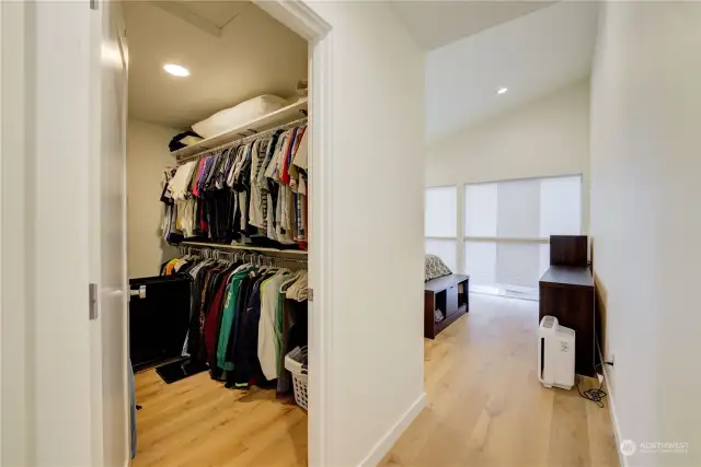 Oversized walk-in closet in spacious master bedroom.