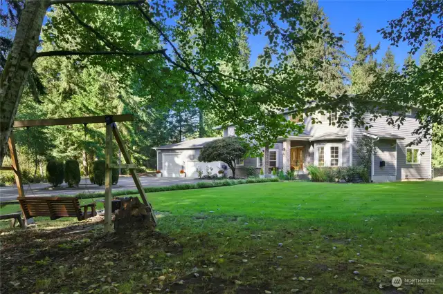 Charming Swing and fire pit with the perfect view of your new home!