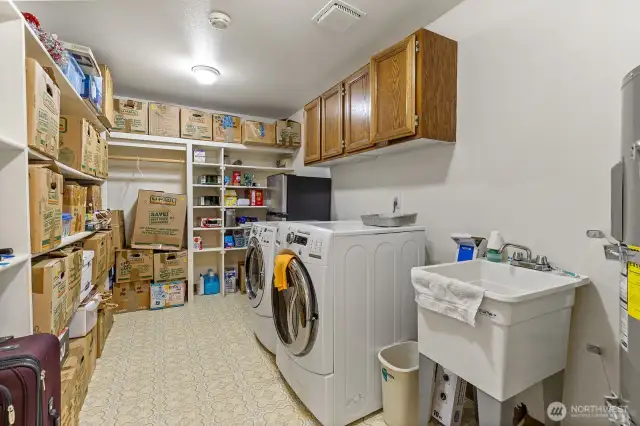 Utility room with washer and dryer.