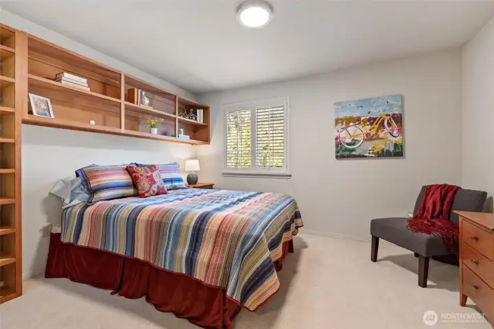 2nd floor guest room #2 with custom cedar cabinets, walk-in closet with custom built in cabinets.