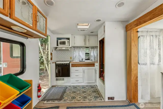 Outdoor semi-permanent space for additional playroom, office, or storage