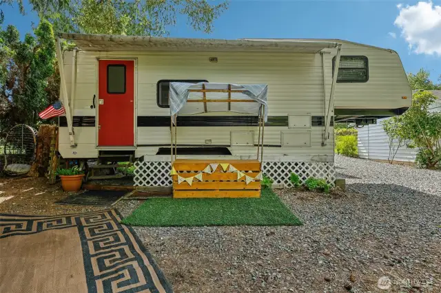 Outdoor semi-permanent space for additional playroom, office, or storage