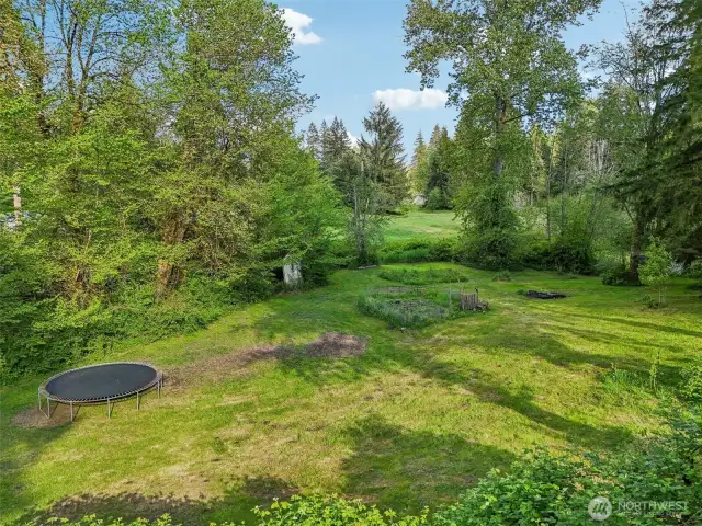 Property to creek (neighbor's well house visible)