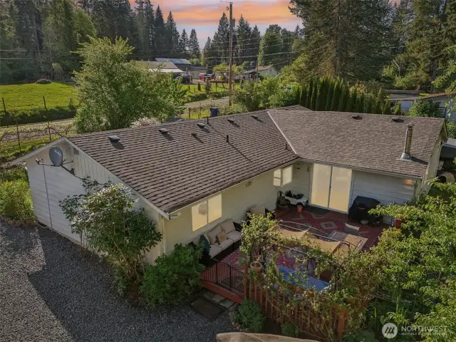 Twilight shot of home's back exterior