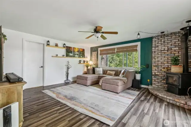 Living room w/ cozy wood burning fireplace