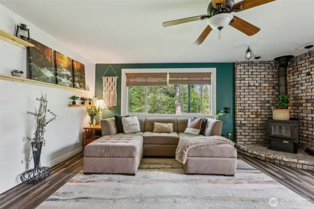 Living Room & Fireplace w/beautiful hearth.