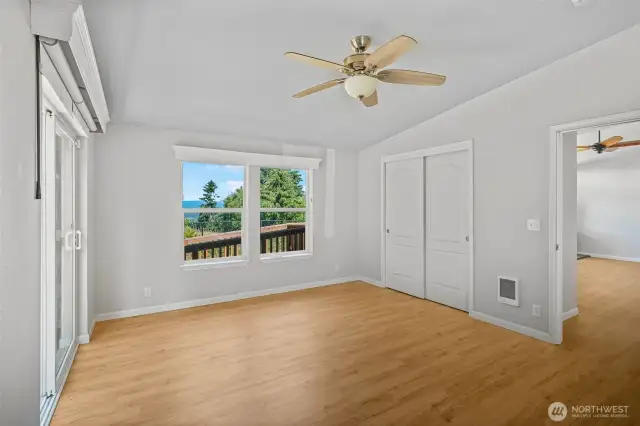 In the primary bedroom and throughout the home you can enjoy the added touch of new custom shades—perfect for privacy, light control, and a modern finish.