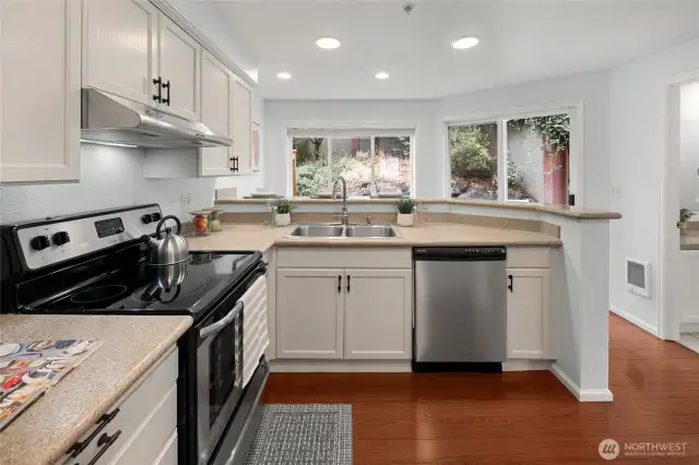 Main level powder room is seen on the right.