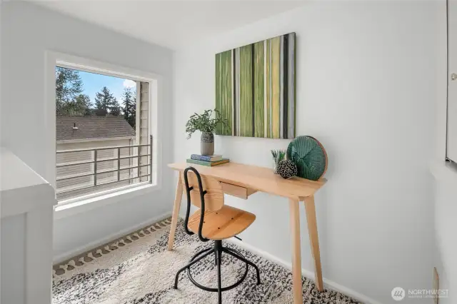 Extra alcove for office space or playroom in second bedroom.