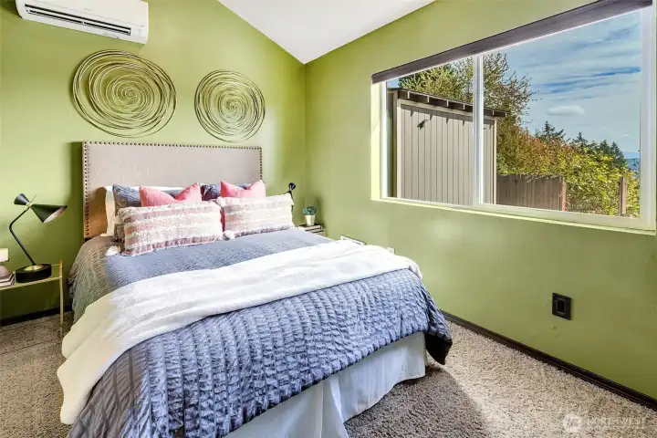 Primary bedroom with BIG view window. Wake up with Mt Rainier every morning.