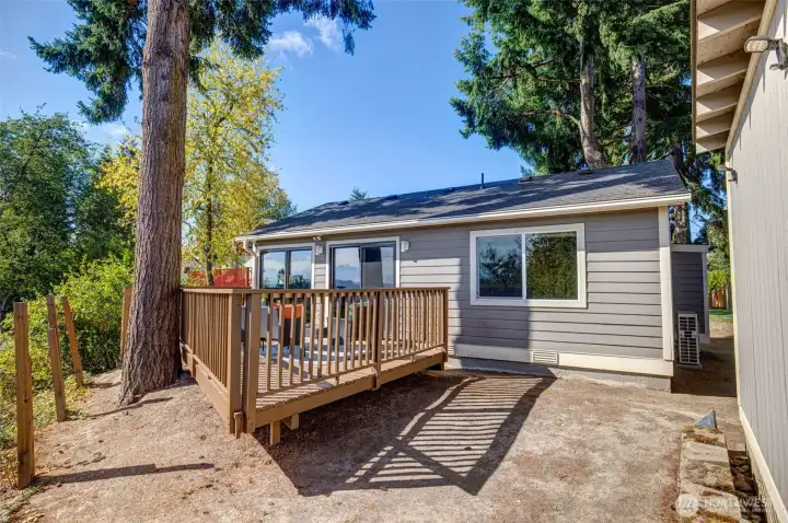 Wrap around deck is easily accessed from kitchen/living/dining areas, entertaining is a breeze!