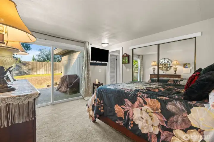 Sliding glass doors lead to the back patio