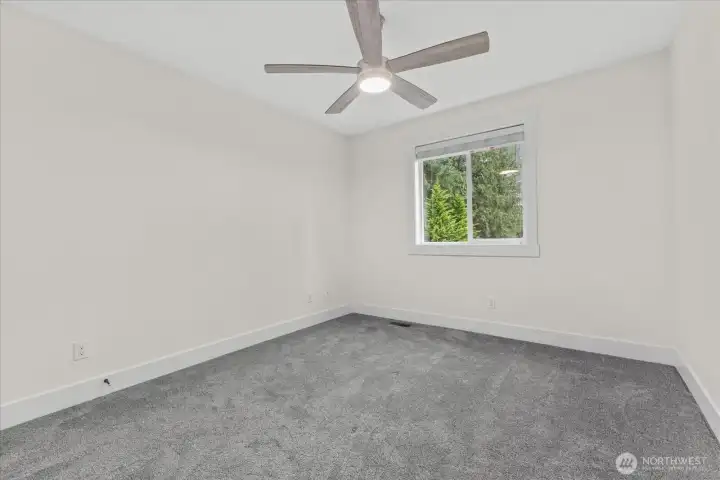 Bedroom #3. Has full-size closet not shown. Window coverings convey