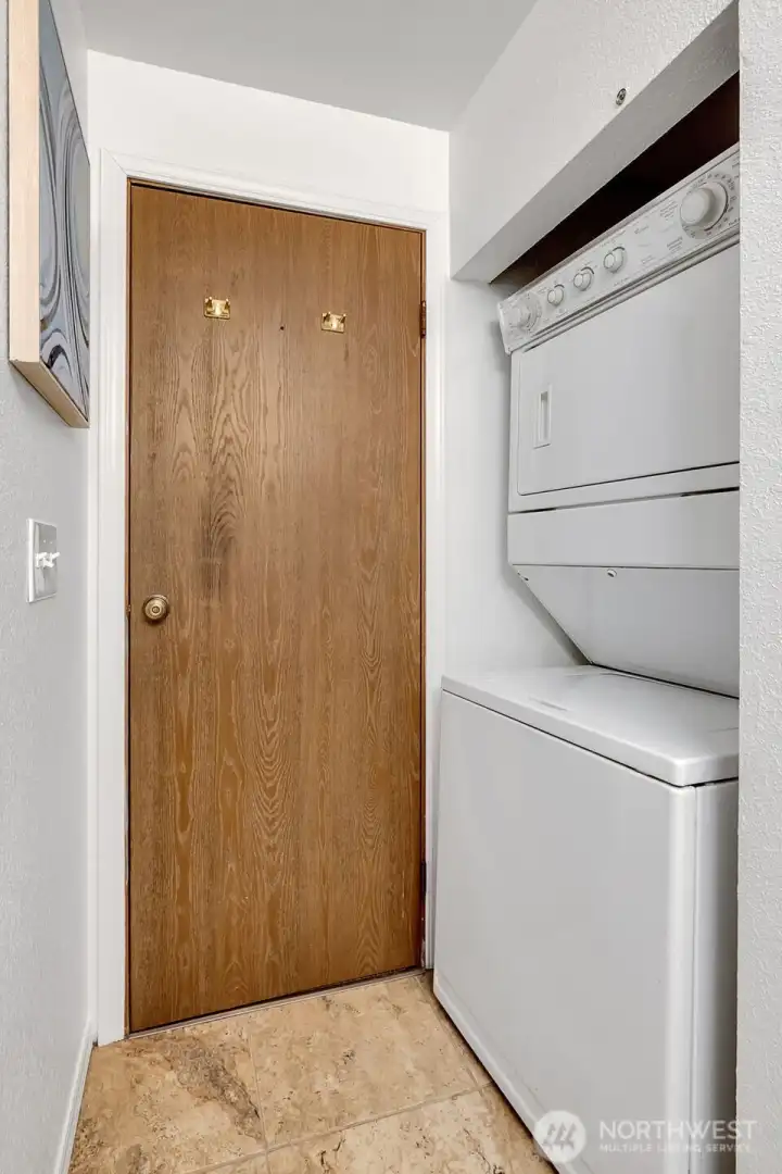 In-unit washer and dryer located in bathroom.