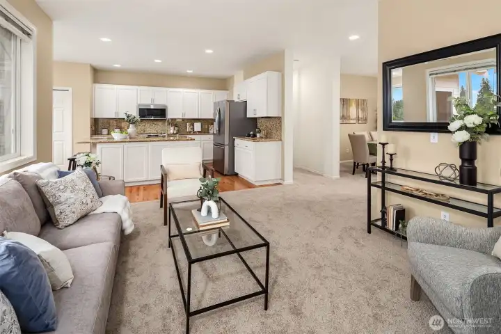 The great room encompasses the family room, kitchen and breakfast nook offering great flow and function on the main floor.