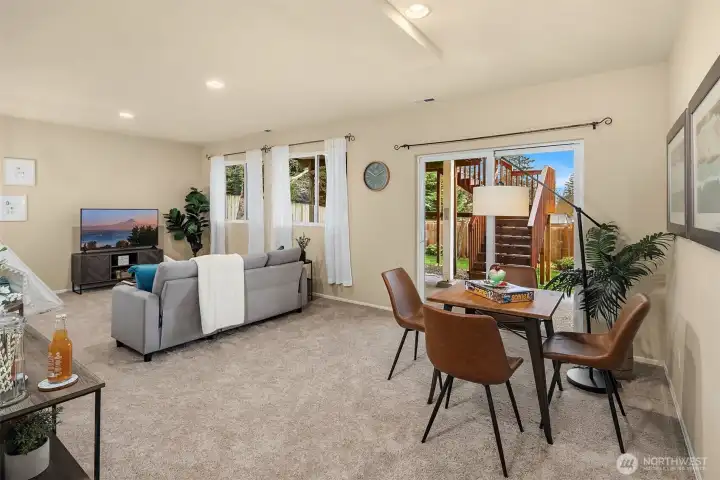 Lower-level recreation room with rear yard access.