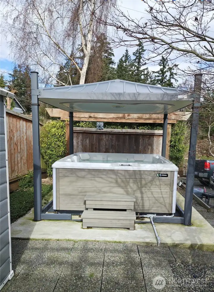 $12,000 hot tub installation with an electronically controlled adjustable roof for an extra cost of $6500. Put the roof down to keep the heat in. When you want to enjoy a hot tob just raise the roof and enjoy.
