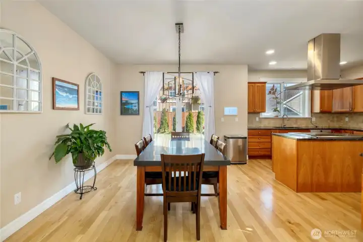 Dining room with sliding door that extends to indoor outdoor options.