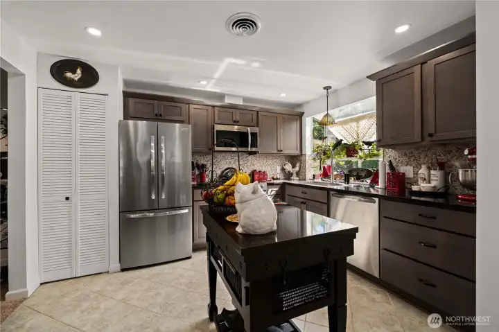 Includes custom island w matching quartz counter