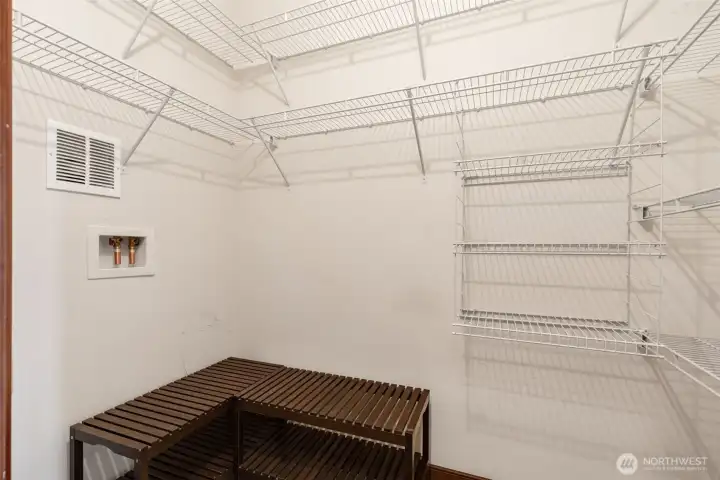 This very large walk-in closet also has a washer/dryer hook up. Owner removed w/d bc the community laundry is just steps away from front door of condo