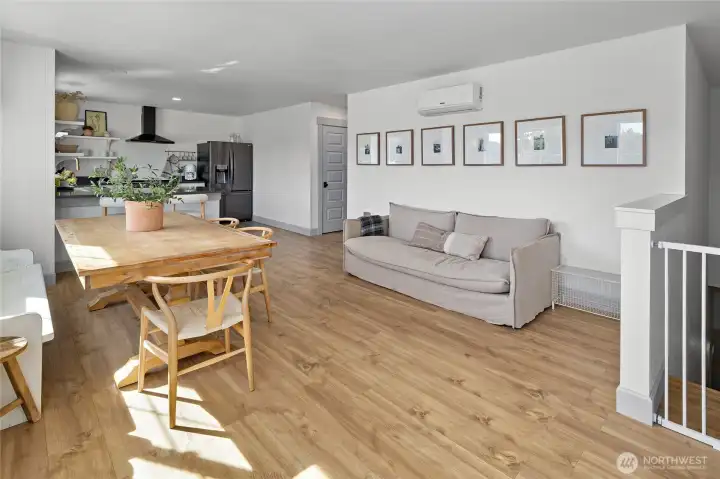 LVP flooring—both practical and beautiful—flows throughout the living area. Mini split heat pump provides heat and cooling.