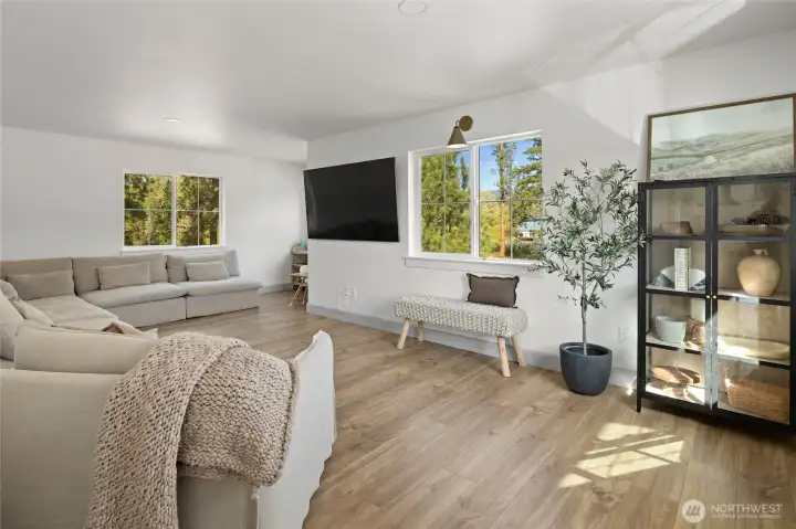 This bonus space easily serves as a media room, play area, or gathering spot.