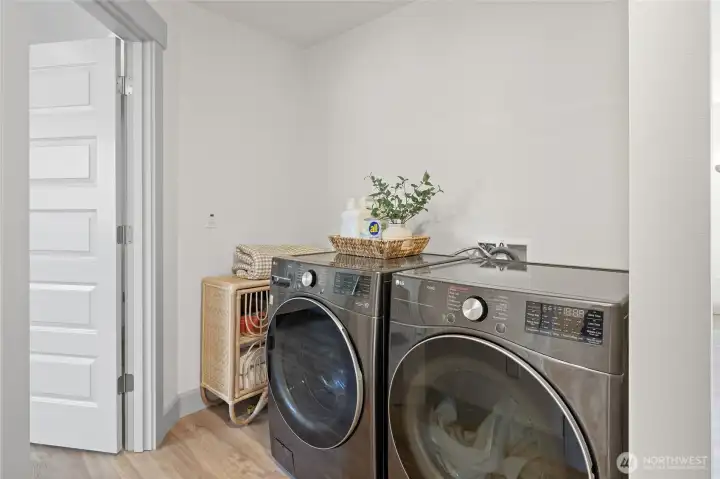 Efficiently designed with a functional space for a full-size washer and dryer.