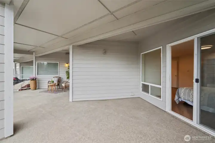 Large covered deck off primary bedroom