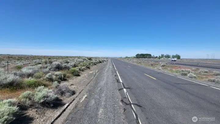 North side of property, from South Frontage Rd NW facing West