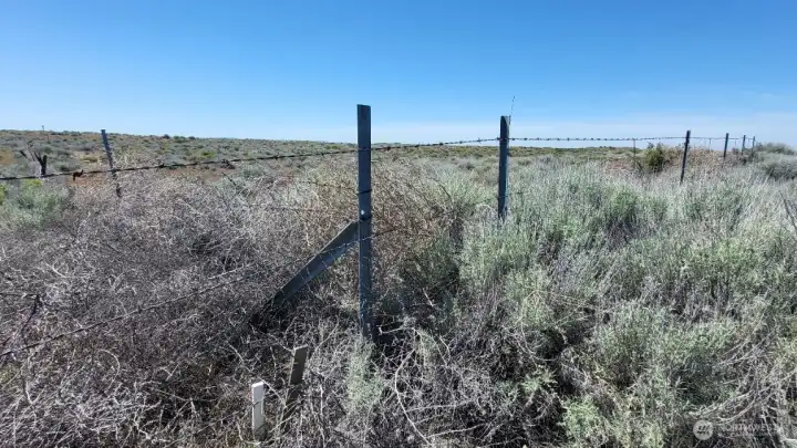 Also, Northeast corner marker (S Frontage Rd NW side)