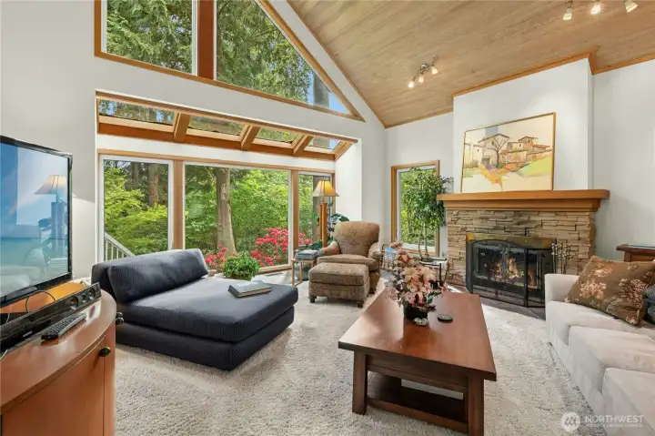 Soaring 24-foot cedar ceilings create a breathtaking sense of scale.