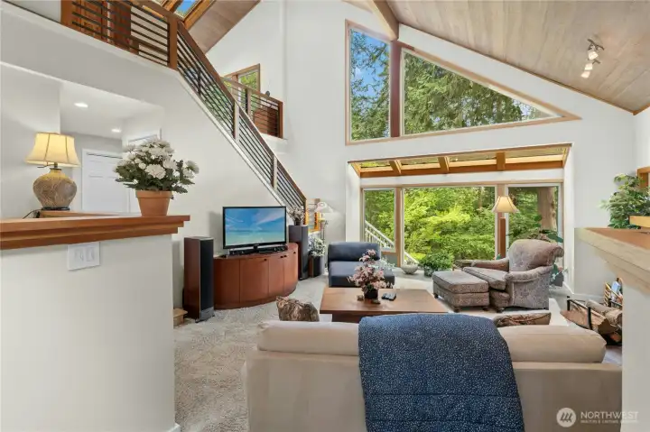 Walls of windows flood the home with incredible year-round natural light