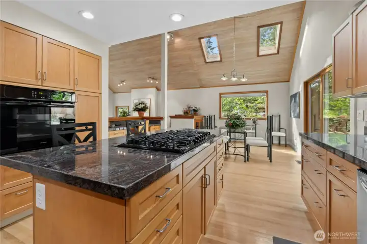 Open-concept living with seamless flow between kitchen & gathering spaces