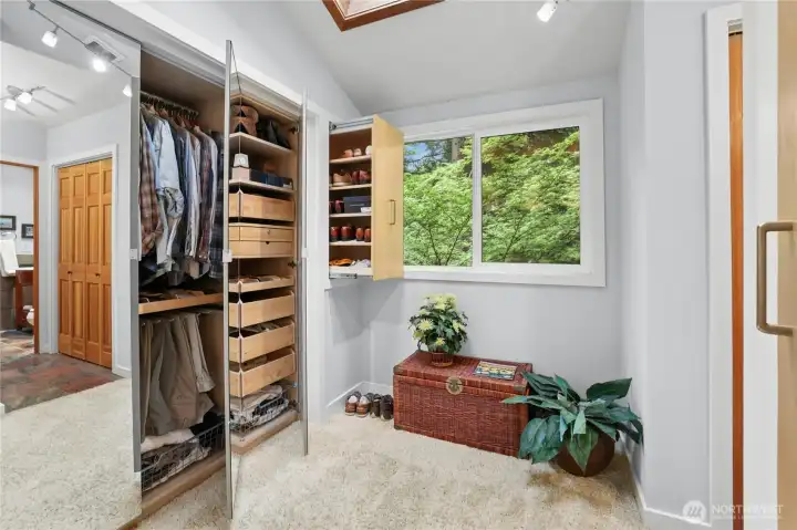 Private dressing room adds a boutique luxury feel to the primary suite.