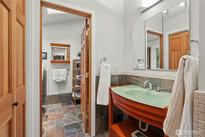 Luxurious primary suite with serene greenbelt outlooks