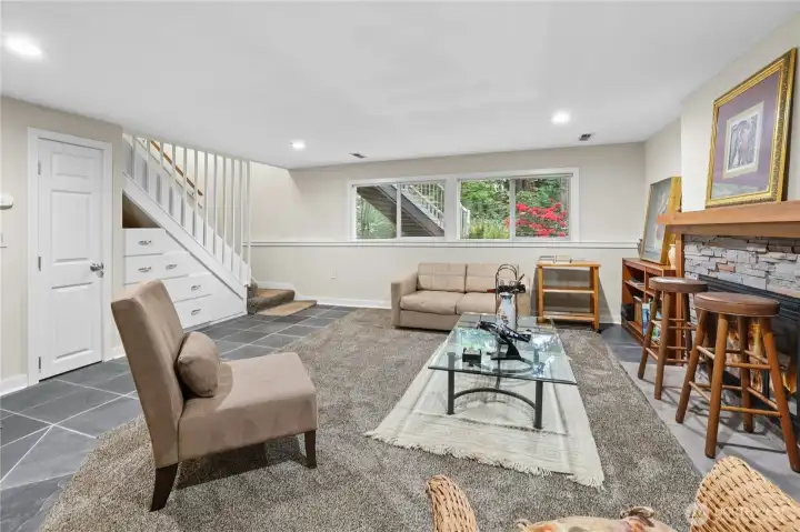 Two wood-burning fireplaces create warmth & ambiance throughout the hom