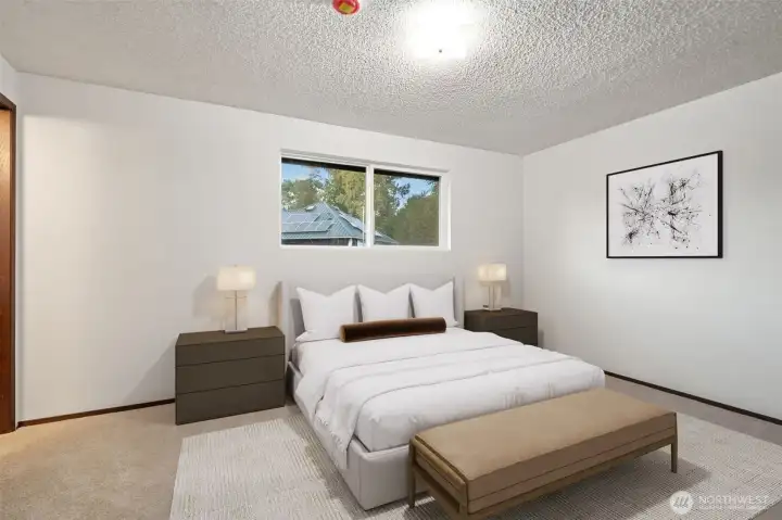 Primary bedroom with double closets & full bathroom and bathtub. Fresh paint and carpets - Virtually staged to give you a sense of the potential!