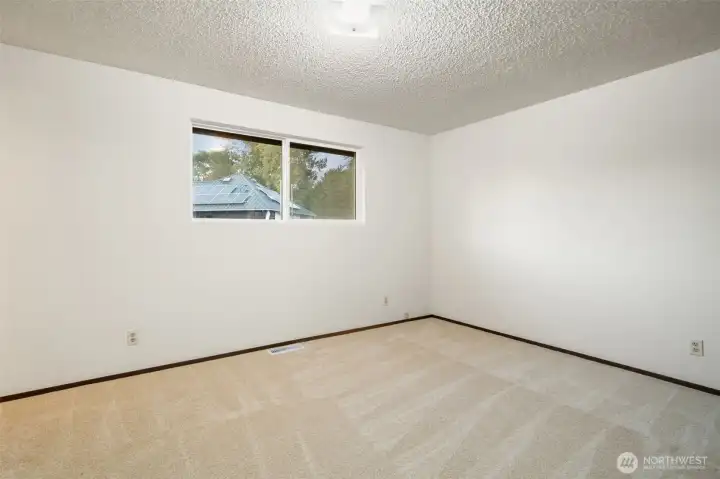 Main level bedroom - shown here without virtual staging
