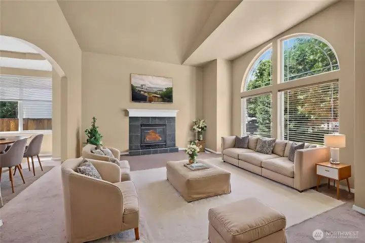 Formal Living Room features a Gas Fireplace with additional electrical option.