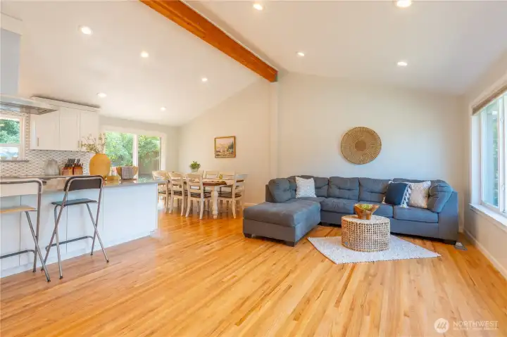Beautiful hardwood floors gleam in this open concept living space.