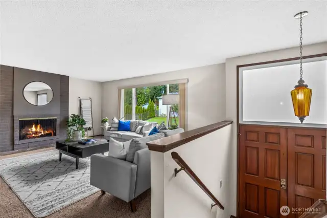 Living room with Wood Burning Fireplace. Beautiful Double door Entry