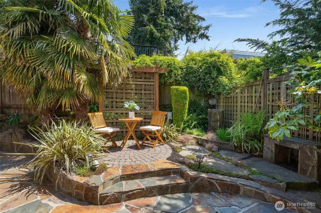 Low maintenance yard with mature landscaping. The spot where the bistro table and chairs are has electrical hookup for a hot tub if you wanted to add one.