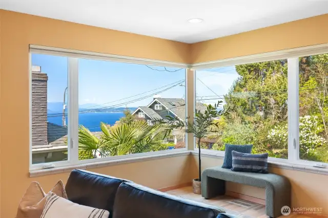 Living room enjoys sound views from the large corner window.
