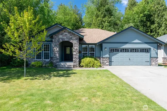 Step into this beautifully designed open-concept living space that seamlessly connects the kitchen, dining, and family room—perfect for entertaining or relaxing at home.